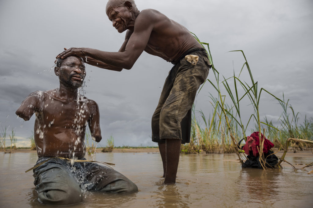 Men washing, Tanzania, 2013