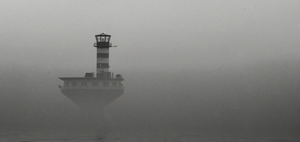 Lighthouse in the mist, Tadoussac, Quebec