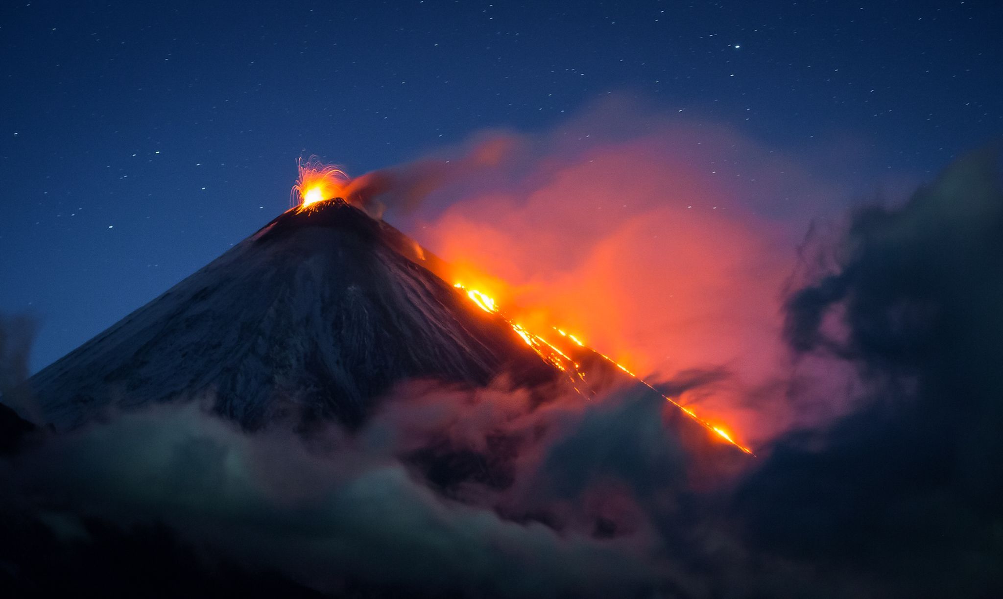 Volcanic eruption by night