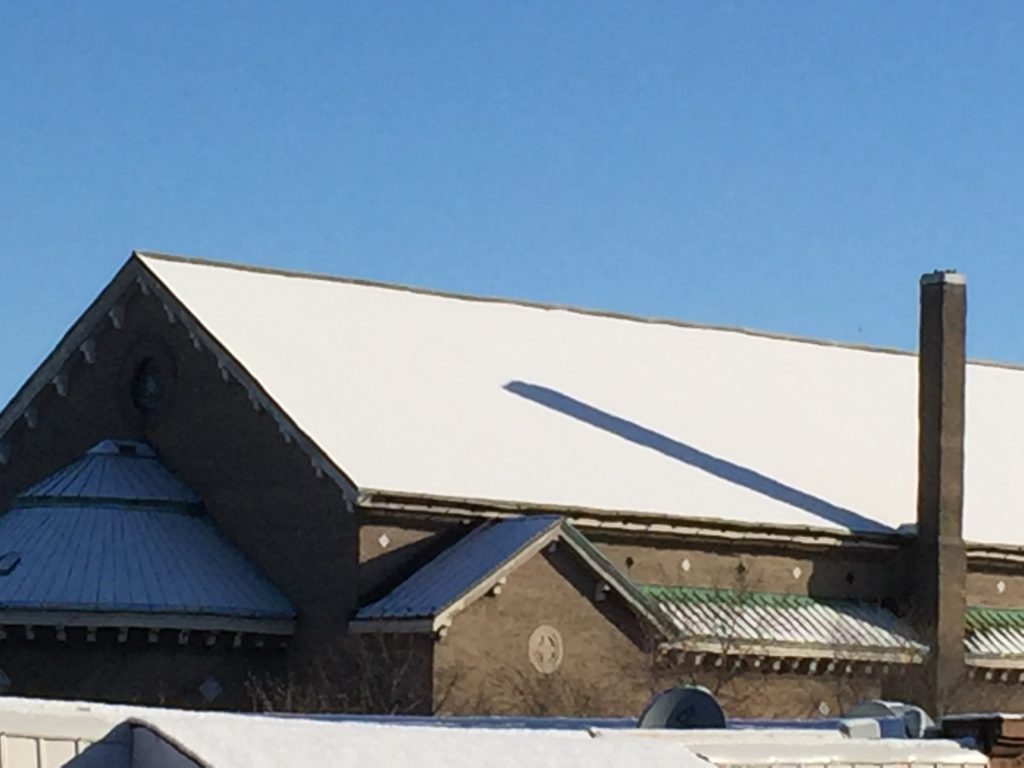 Shadow on snowy roof